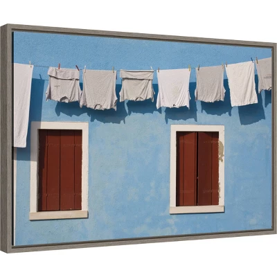 Amanti Art Hanging Laundry Along Blue Wall Framed Canvas by Brenda Tharp 3 Amanti Art Hanging Laundry Along Blue Wall Framed Canvas by Brenda Tharp